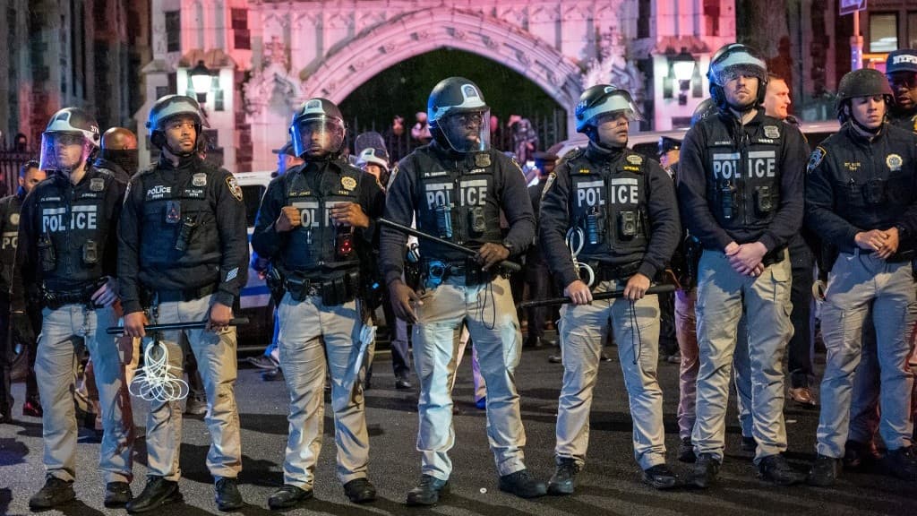 Police look on during pro-Palestinian demonstrations at The CUNY as the NYPD cracks down on protest camps at both Columbia University and CCNY on April 30 (Spencer Platt/AFP)