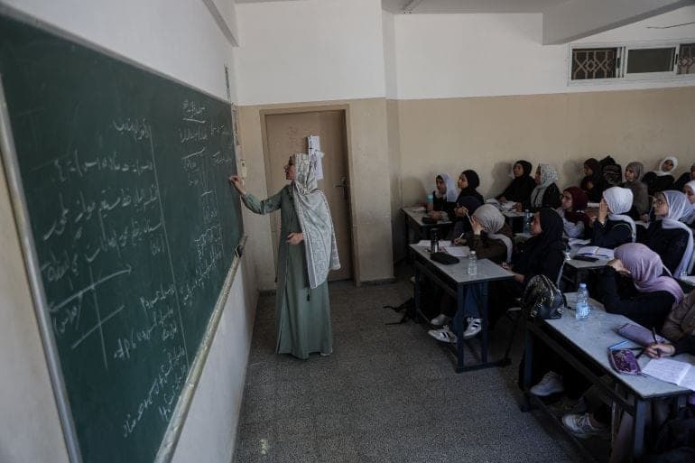 Maha Taha, 43, has taught mathematics at Muscat Secondary School for Girls for 20 years. In June 2023, she posed for a selfie with 15 of her pupils. Three years later, she still keeps the photograph on her phone