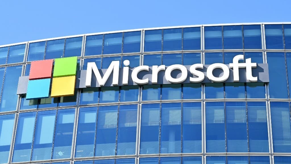 The logo of Microsoft displayed on the facade of the company's French headquarters in Issy-les-Moulineaux, on the outskirts of Paris, on 24 April 2026 (AFP)